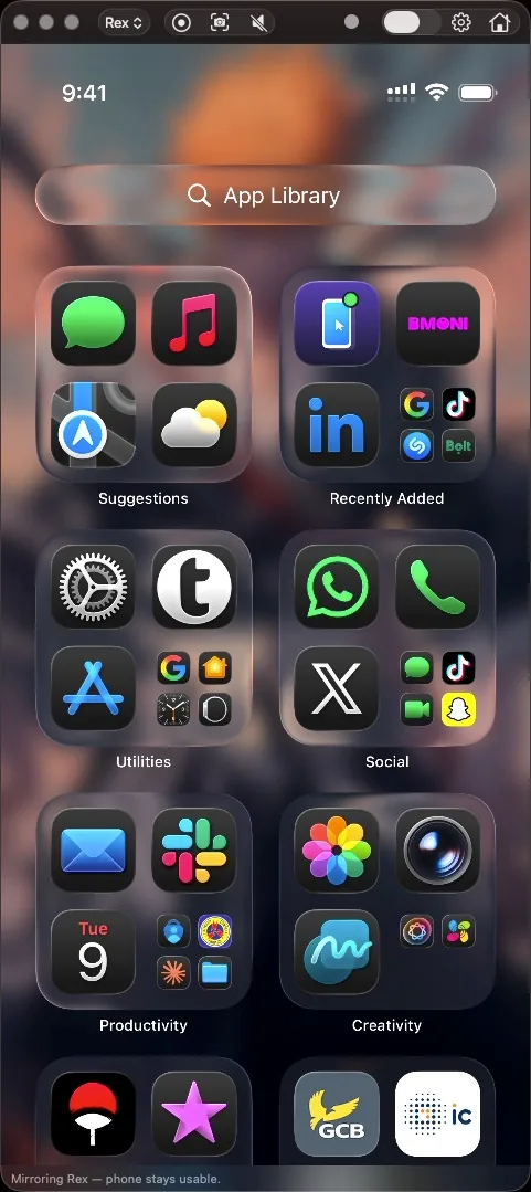 An iPhone home screen mirrored live in a Mac window with the iMirror toolbar